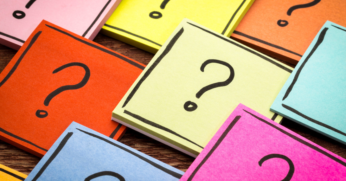 Colorful note cards with question marks on them