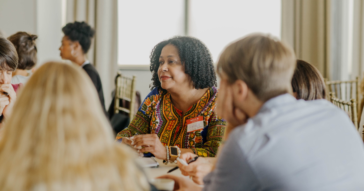 2025 LION Community Ambassador Kimberly Griffin, publisher and CRO of Mississippi Free Press, connects with attendees at a 2023 LION event.